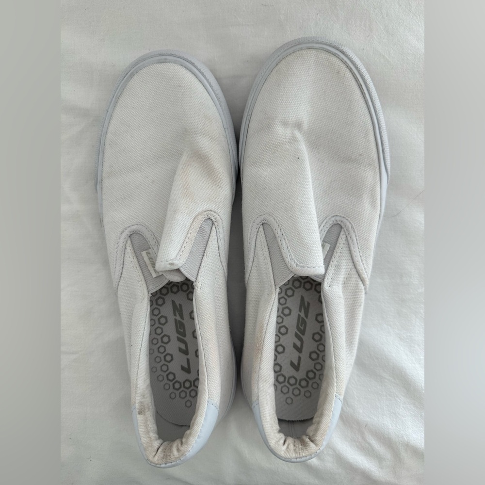 Woman white shoes.